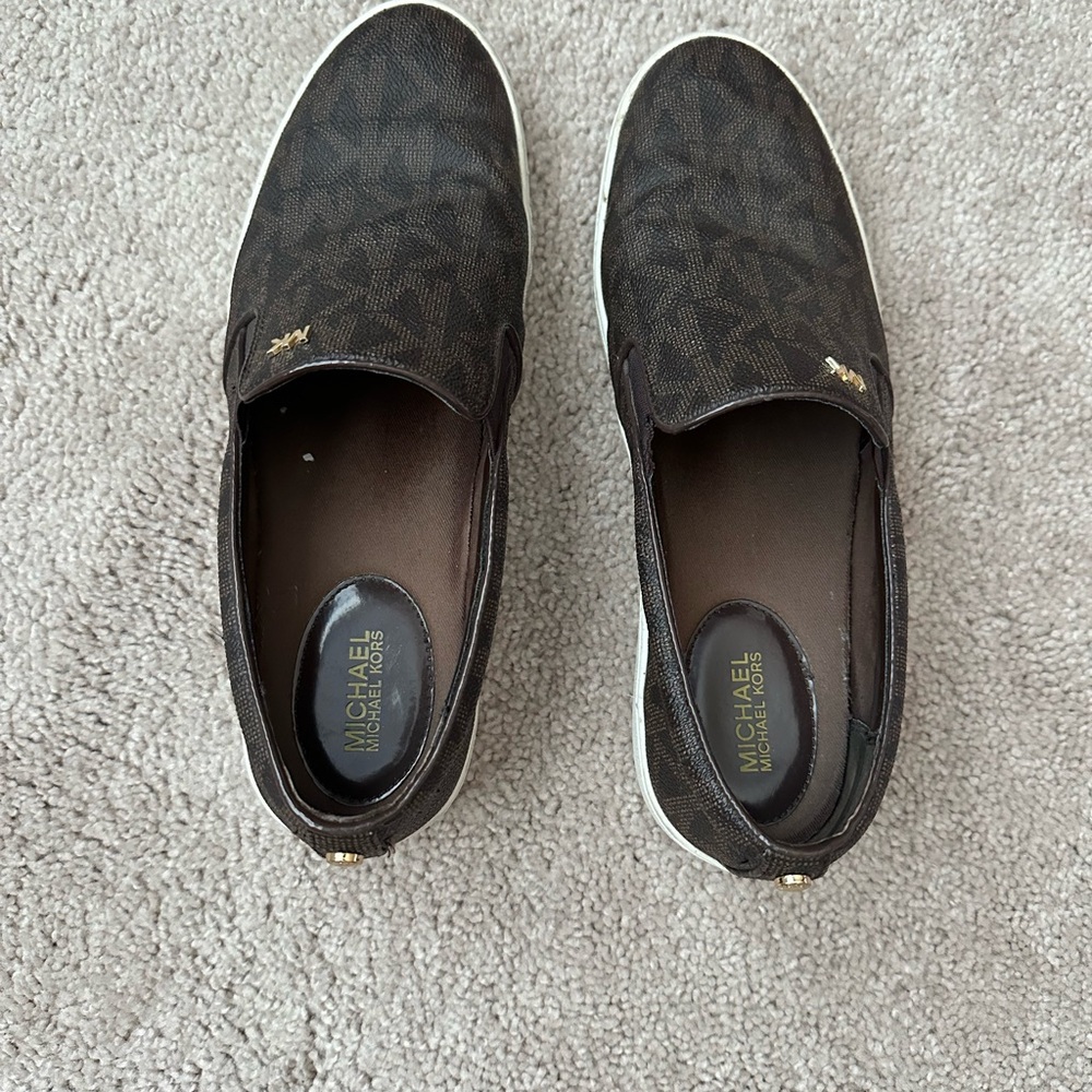 Michael Kors logo brown flats with white sole